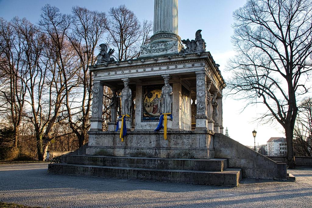 Team meeting in modern office with plans and technology